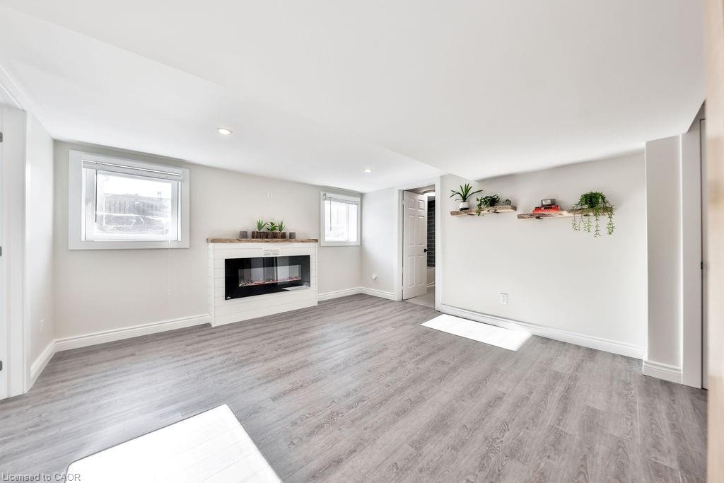 Lower-47 Castlefield Drive, Hamilton, ON - Indoor Photo Showing Living Room With Fireplace
