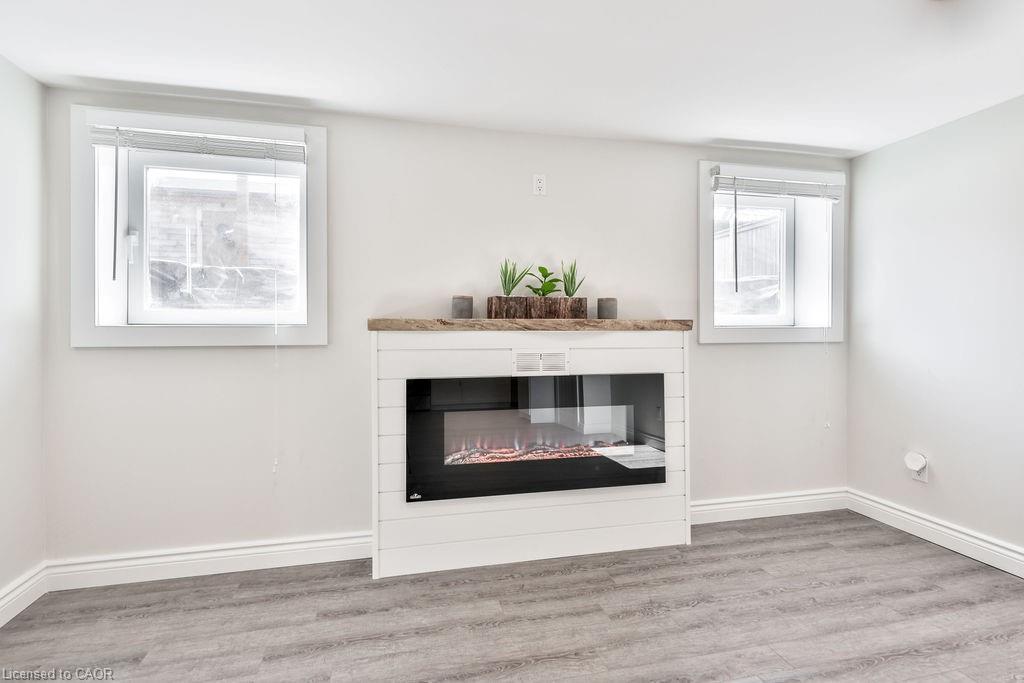 Lower-47 Castlefield Drive, Hamilton, ON - Indoor Photo Showing Living Room With Fireplace