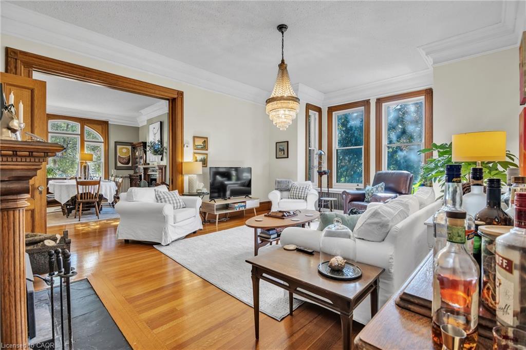 105 Vansittart Avenue, Woodstock, ON - Indoor Photo Showing Living Room With Fireplace