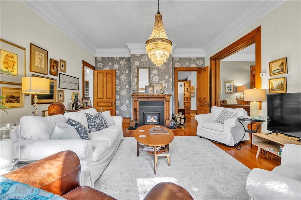 105 Vansittart Avenue, Woodstock, ON - Indoor Photo Showing Living Room With Fireplace