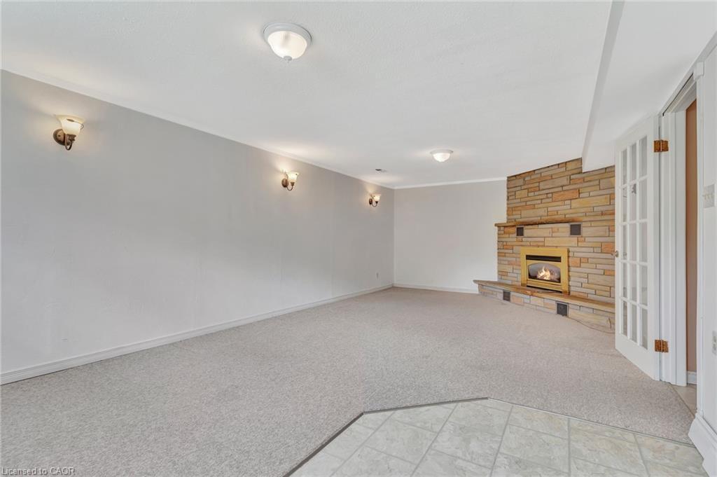 528 Havelock Drive, Waterloo, ON - Indoor Photo Showing Other Room With Fireplace