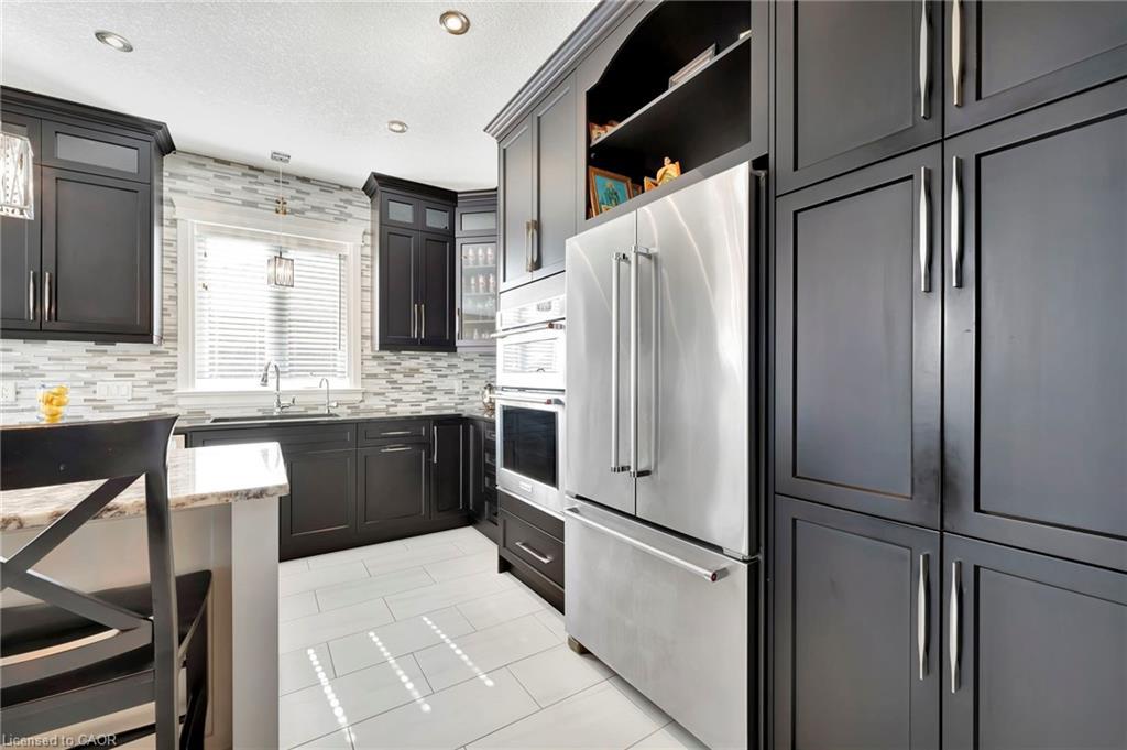 107 Forbes Crescent, Listowel, ON - Indoor Photo Showing Kitchen With Upgraded Kitchen