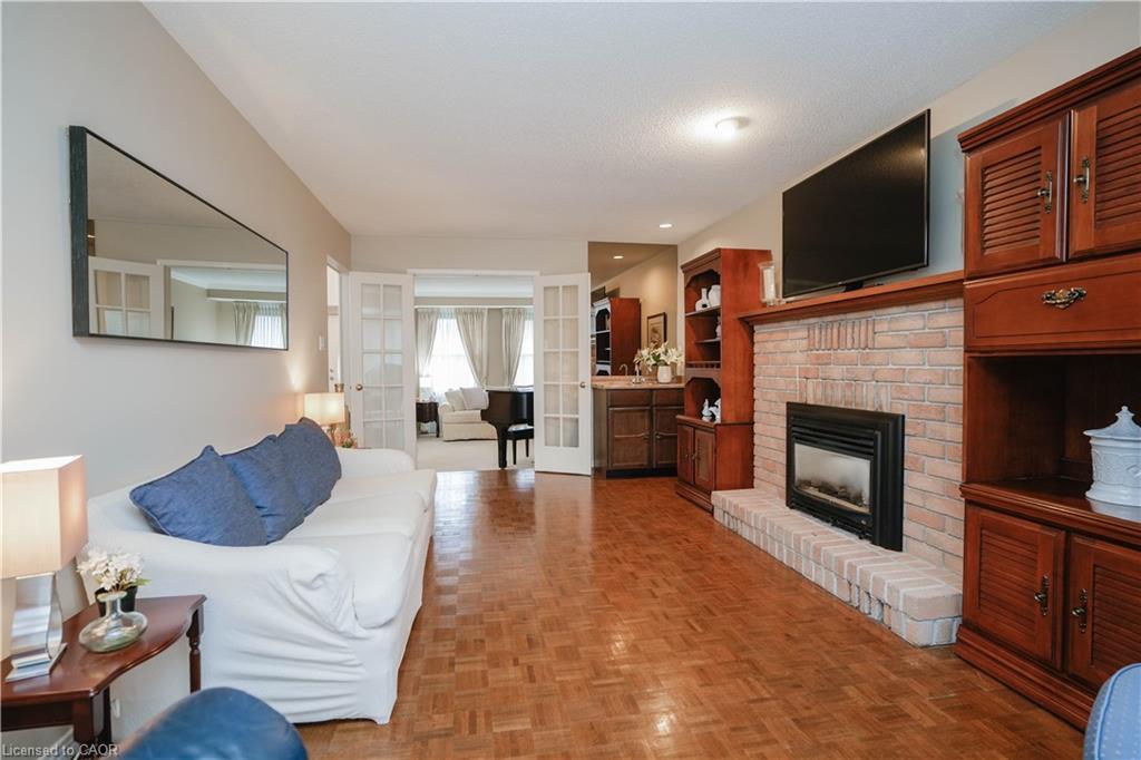 9 Longwater Chase, Markham, ON - Indoor Photo Showing Living Room With Fireplace