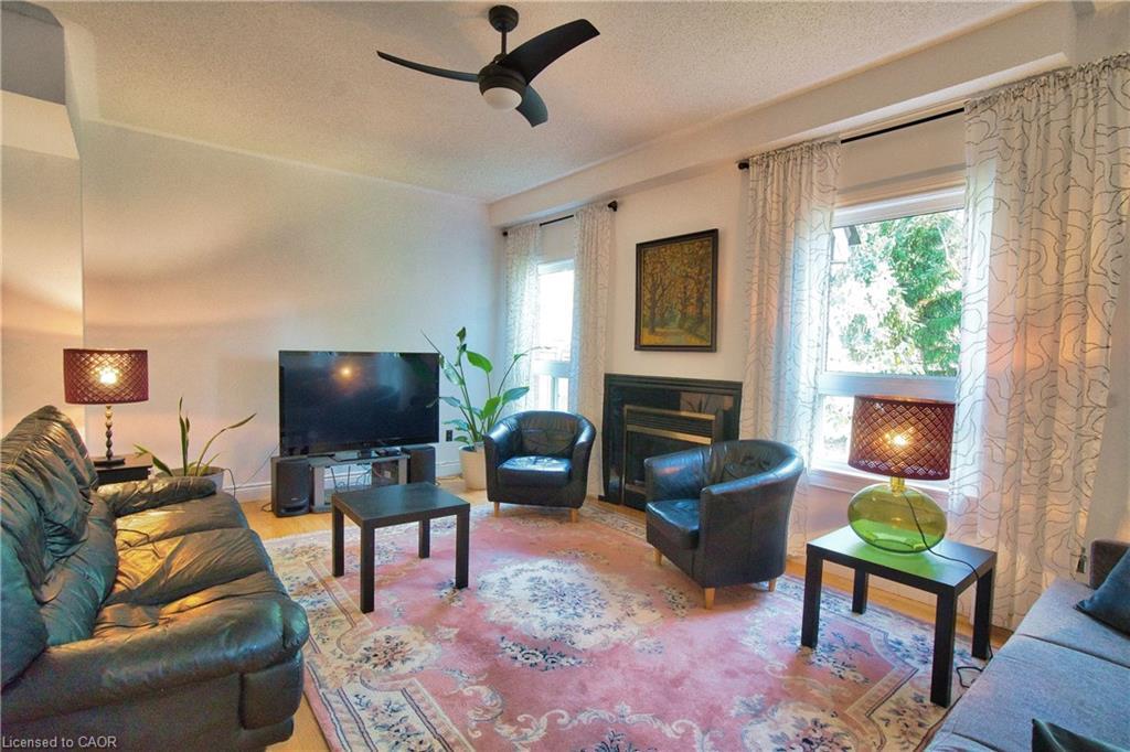 491 Pettit Trail, Milton, ON - Indoor Photo Showing Living Room With Fireplace