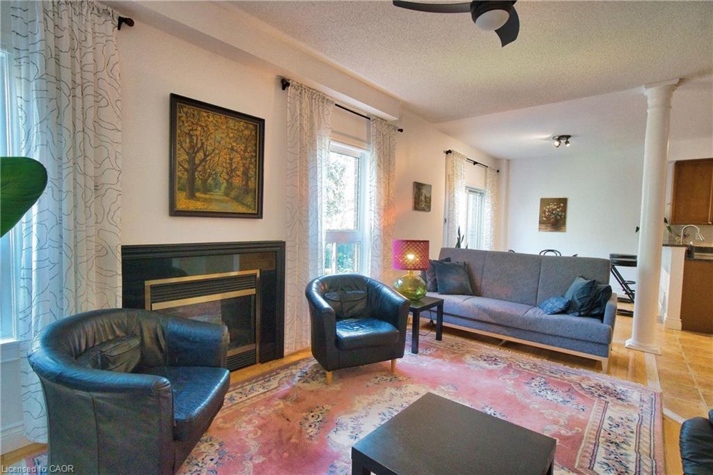 491 Pettit Trail, Milton, ON - Indoor Photo Showing Living Room With Fireplace