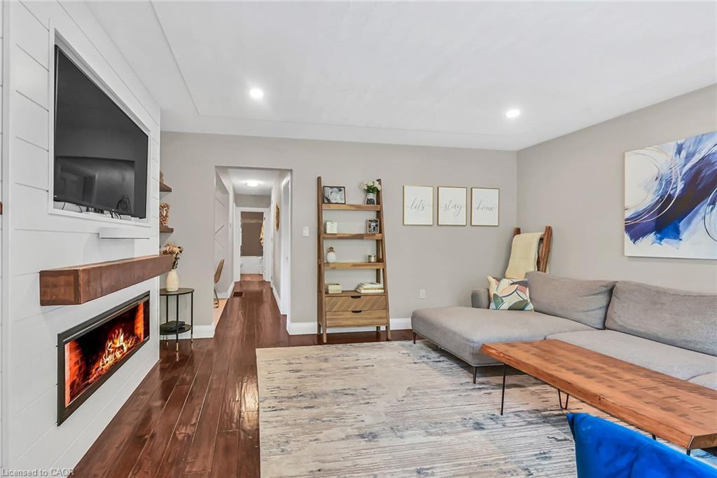 A-174 Kings Forest Drive, Hamilton, ON - Indoor Photo Showing Living Room With Fireplace