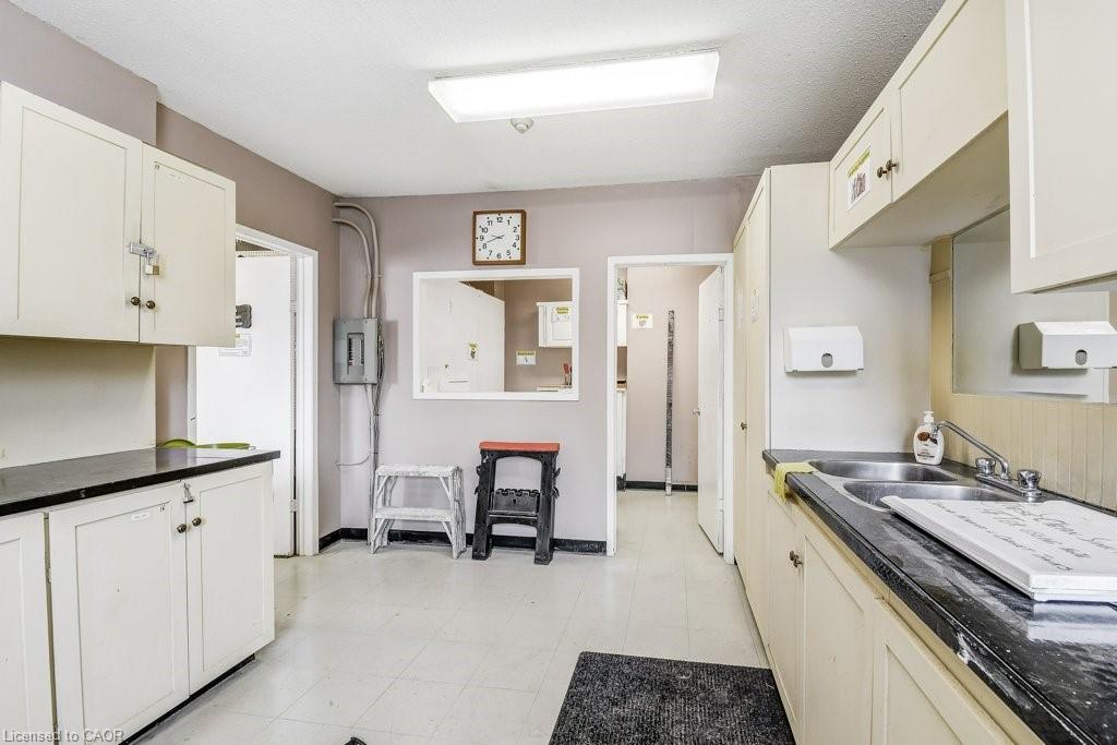 205-2055 Upper Middle Road, Burlington, ON - Indoor Photo Showing Kitchen With Double Sink