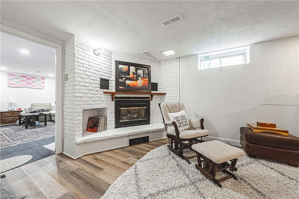 44 Billington Crescent, Hamilton, ON - Indoor Photo Showing Basement With Fireplace