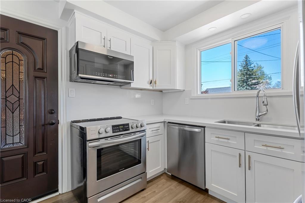 879 Upper Sherman Avenue, Hamilton, ON - Indoor Photo Showing Kitchen With Double Sink