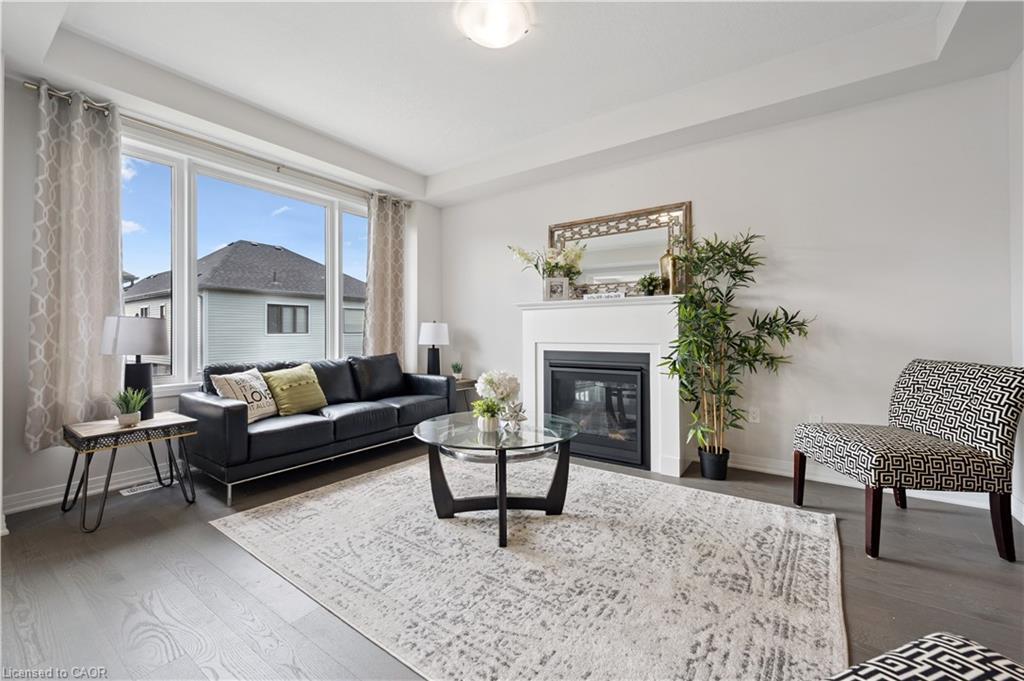 445 Robert Woolner Street, Ayr, ON - Indoor Photo Showing Living Room With Fireplace