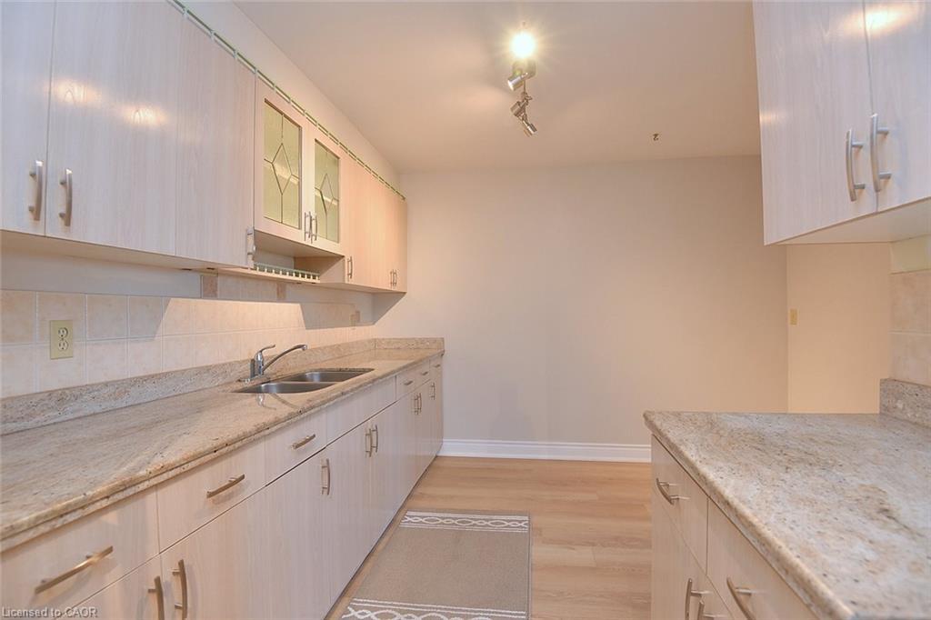 802-627 The West Mall Drive, Toronto, ON - Indoor Photo Showing Kitchen With Double Sink