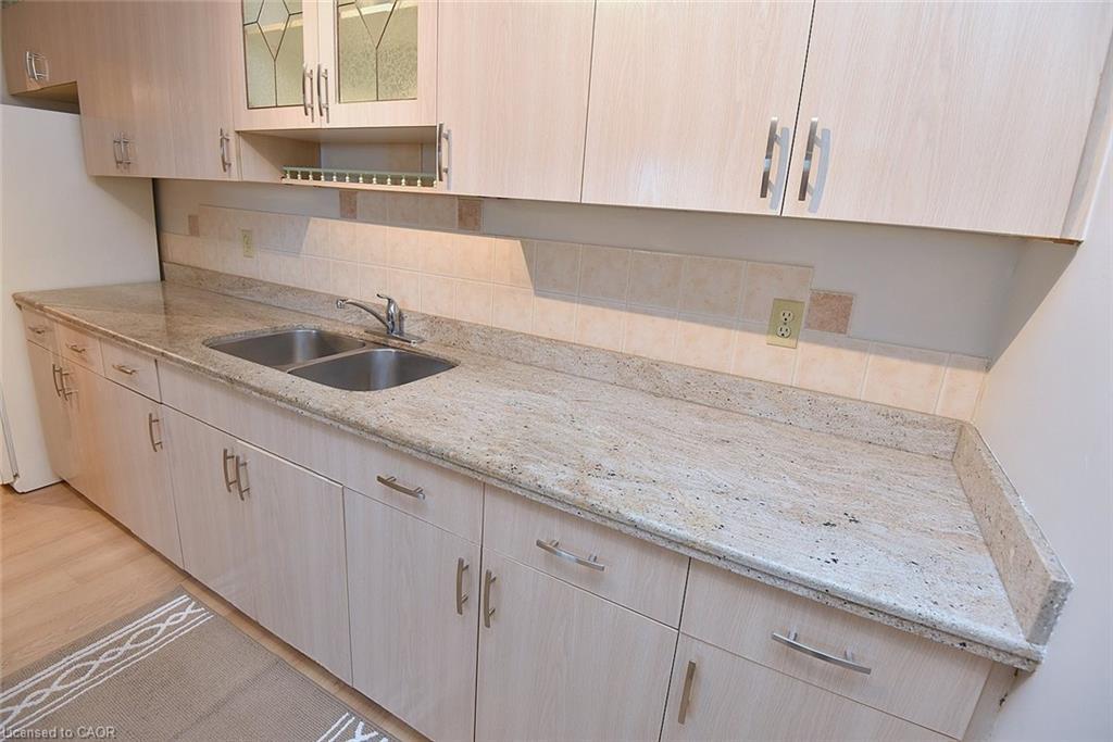 802-627 The West Mall Drive, Toronto, ON - Indoor Photo Showing Kitchen With Double Sink