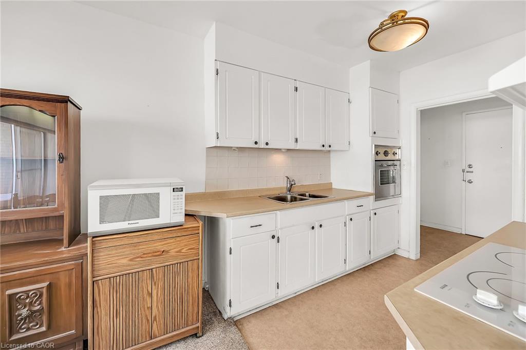 404-510 Queenston Road, Hamilton, ON - Indoor Photo Showing Kitchen With Double Sink