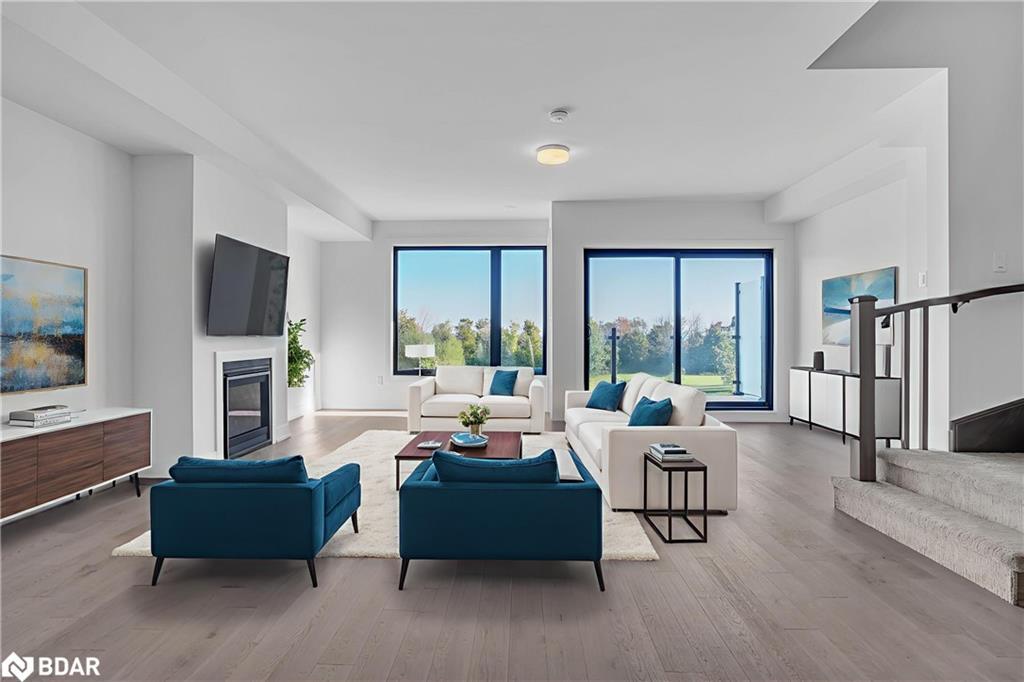 117 Sladden Court Court, Thornbury, ON - Indoor Photo Showing Living Room With Fireplace