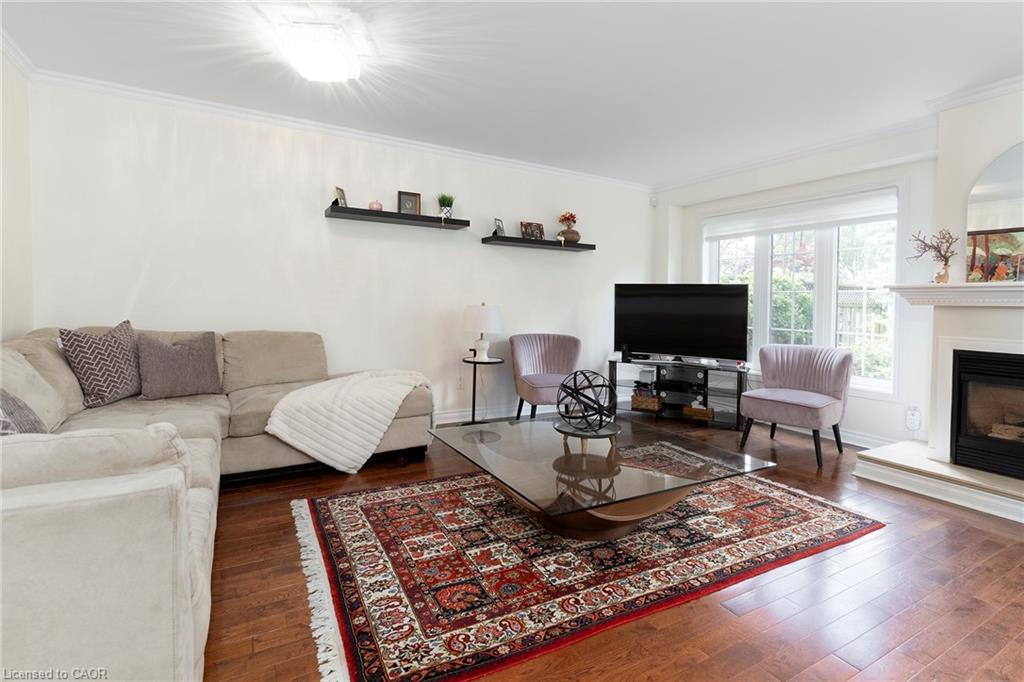 74-3333 New Street, Burlington, ON - Indoor Photo Showing Living Room With Fireplace