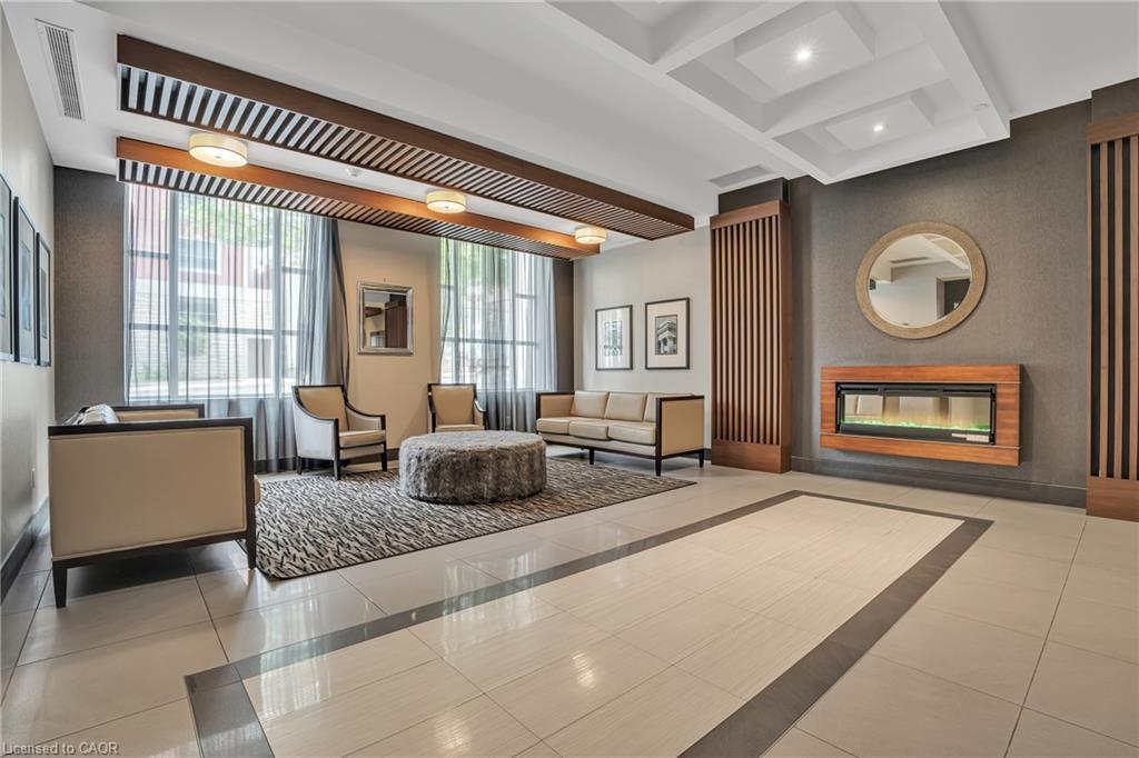 910-150 Main Street W, Hamilton, ON - Indoor With Fireplace