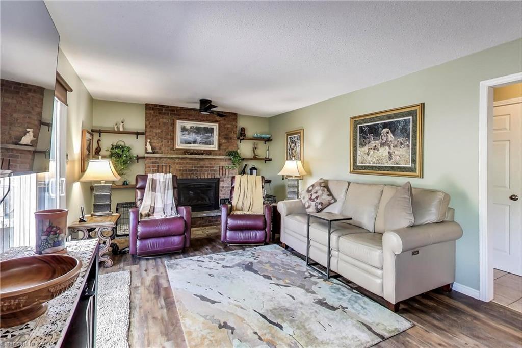 12 Kingsview Drive, Stoney Creek, ON - Indoor Photo Showing Living Room With Fireplace