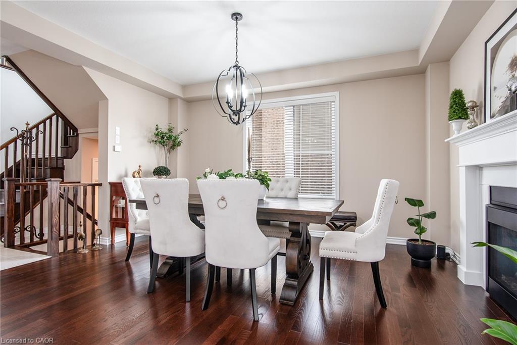 232 Shady Glen Crescent, Kitchener, ON - Indoor Photo Showing Dining Room With Fireplace