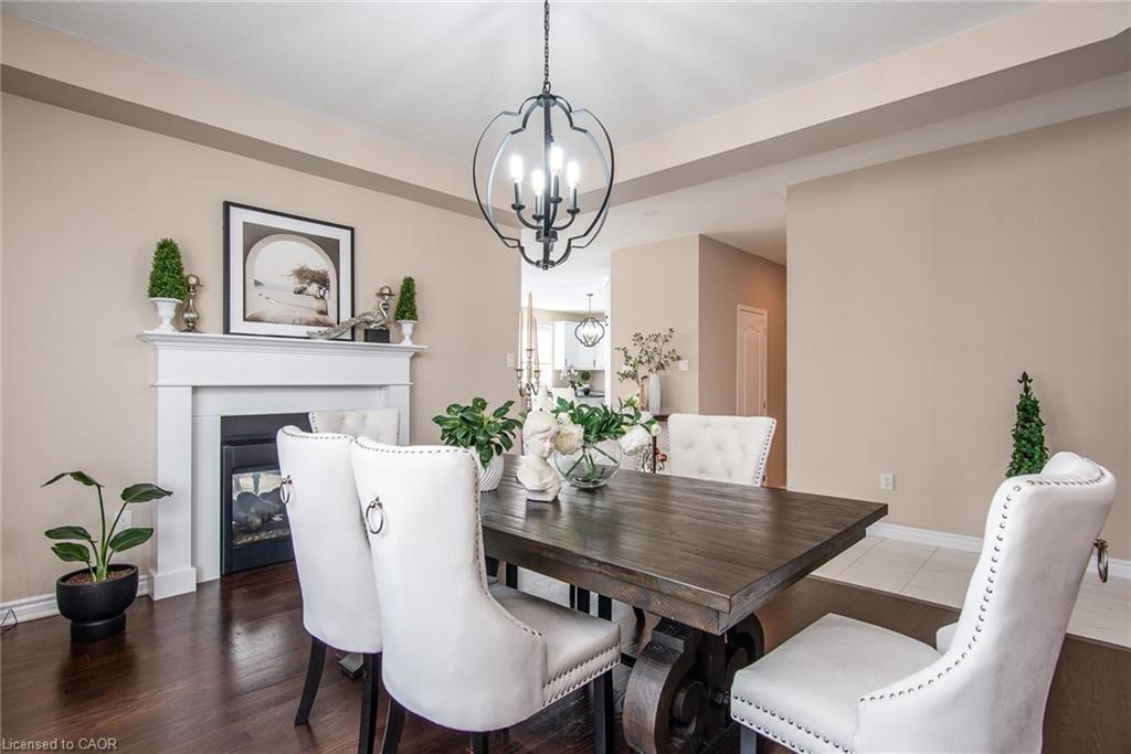 232 Shady Glen Crescent, Kitchener, ON - Indoor Photo Showing Dining Room With Fireplace
