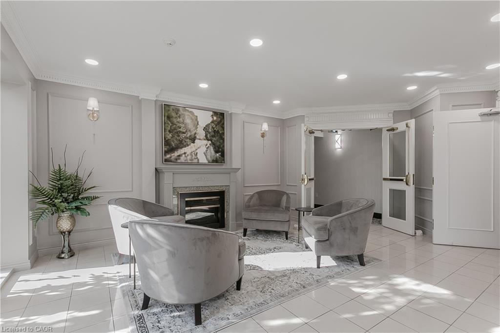 401-2075 Amherst Heights Drive, Burlington, ON - Indoor With Fireplace