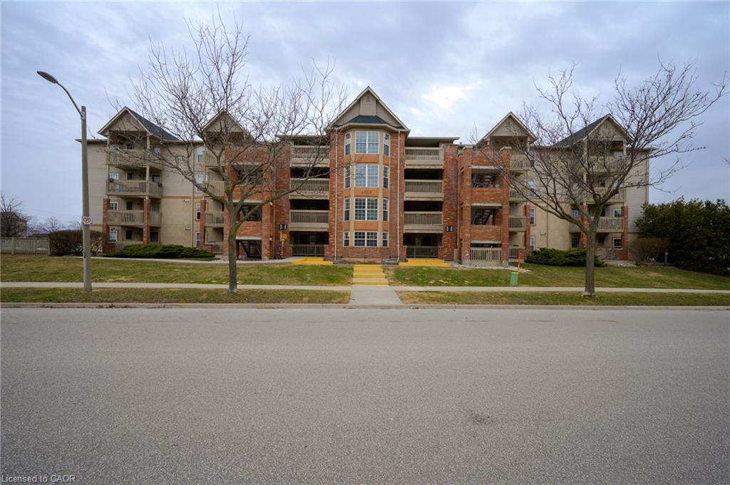 110-4015 Kilmer Drive, Burlington, ON - Outdoor With Balcony With Facade