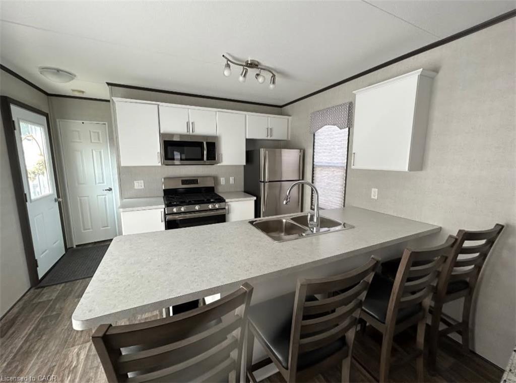 9625 Pike Lake Road, Clifford, ON - Indoor Photo Showing Kitchen With Double Sink