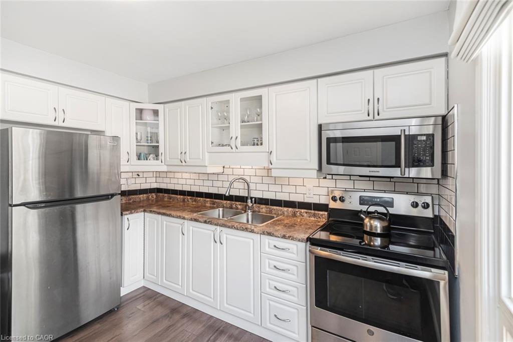 12-1301 Upper Gage Avenue, Hamilton, ON - Indoor Photo Showing Kitchen With Double Sink