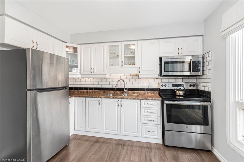 12-1301 Upper Gage Avenue, Hamilton, ON - Indoor Photo Showing Kitchen With Double Sink