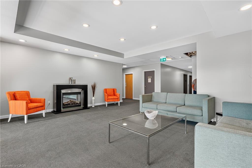 601-170 Water Street N, Cambridge, ON - Indoor Photo Showing Other Room With Fireplace