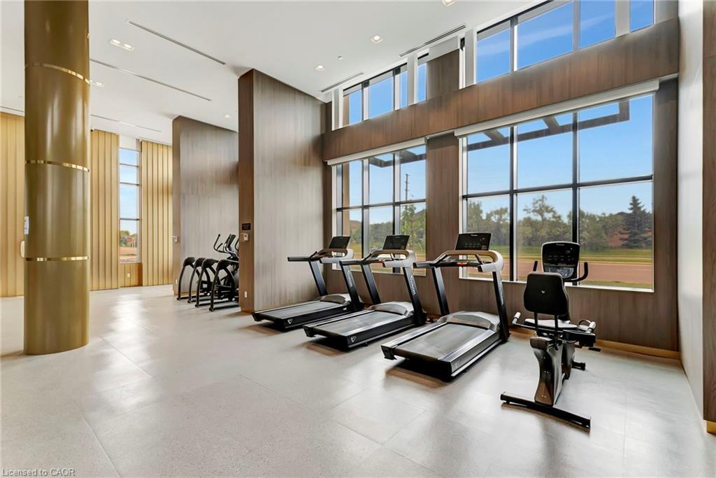 702-405 Dundas Street W, Oakville, ON - Indoor Photo Showing Gym Room