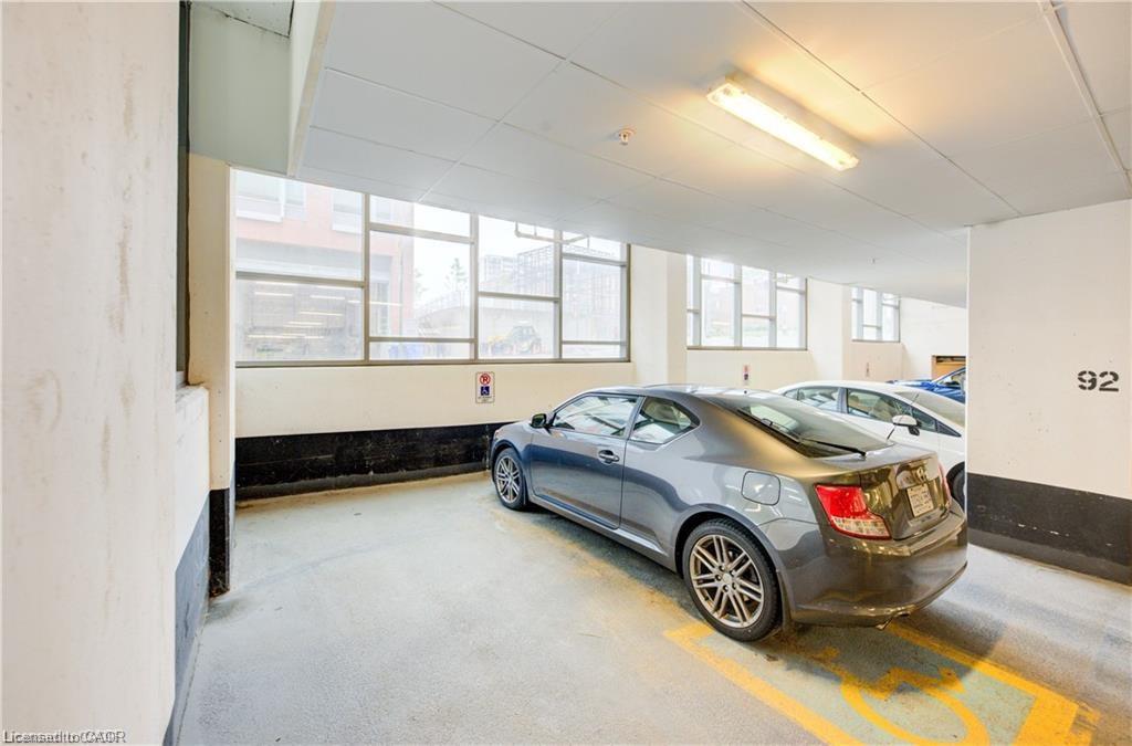 703-85 Duke Street W, Kitchener, ON - Indoor Photo Showing Garage