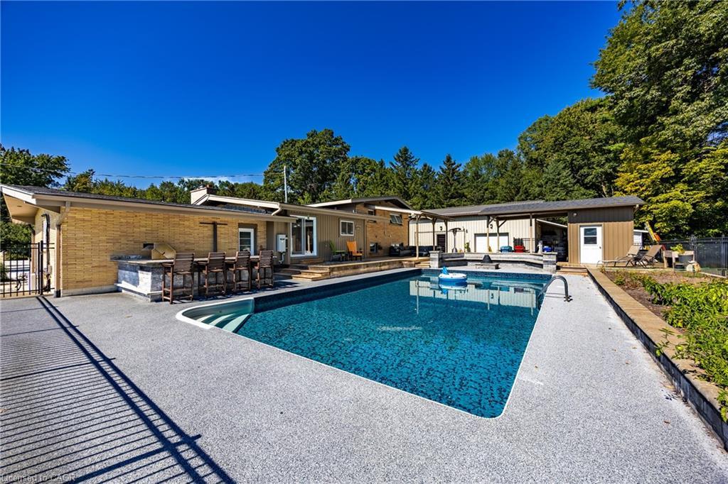 1750 Turkey Point Road, Simcoe, ON - Outdoor With In Ground Pool