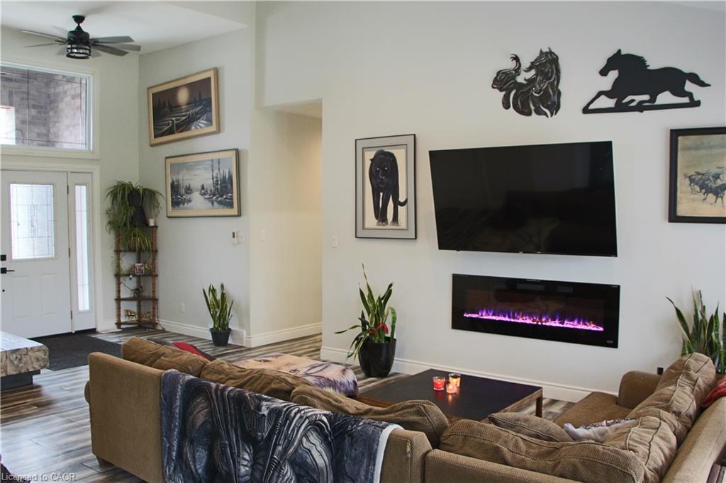 38812 Vienna Street, Varna, ON - Indoor Photo Showing Living Room With Fireplace