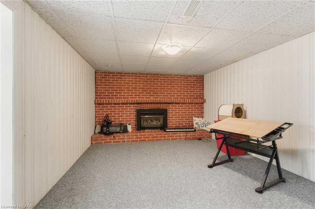 67 Lakeside Drive, Grimsby, ON - Indoor Photo Showing Other Room With Fireplace
