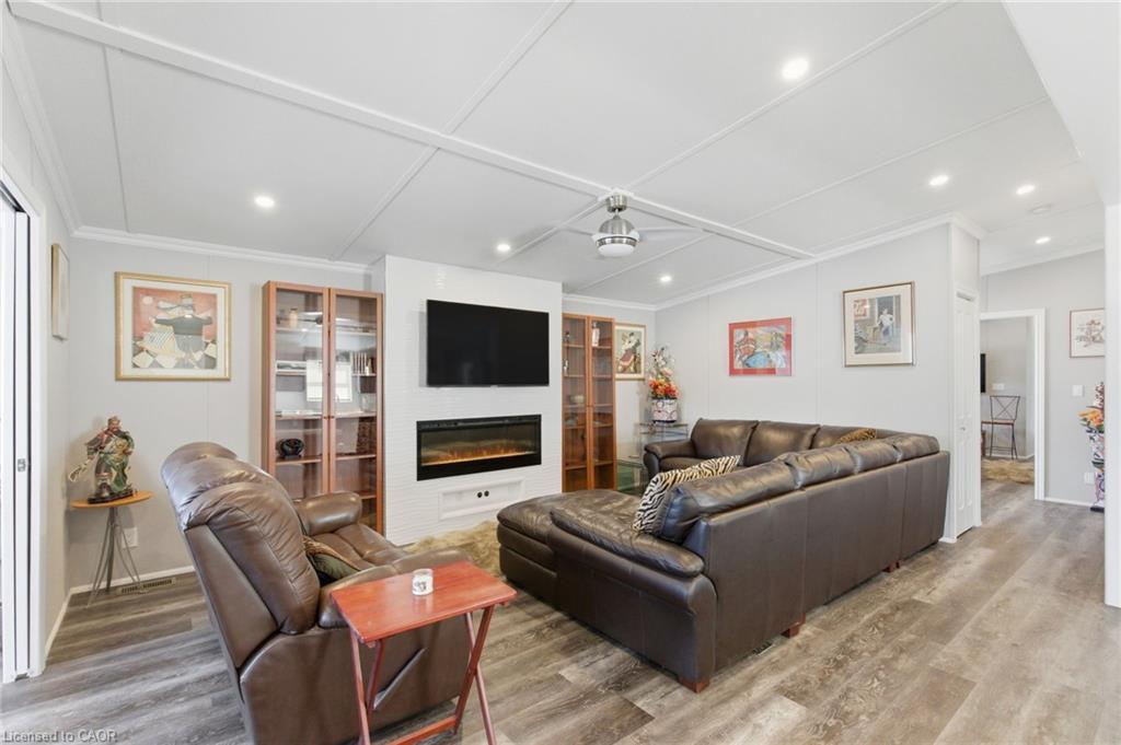 28 Ash Street-4449 Milburough Line, Burlington, ON - Indoor Photo Showing Living Room With Fireplace