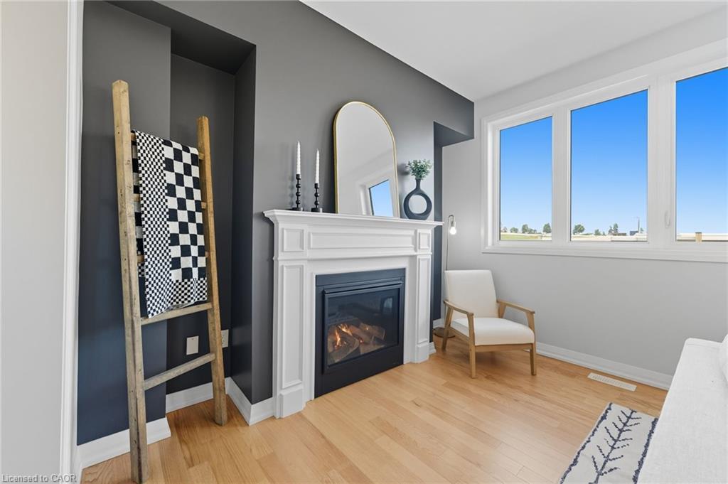 872 Sobeski Avenue, Woodstock, ON - Indoor Photo Showing Living Room With Fireplace