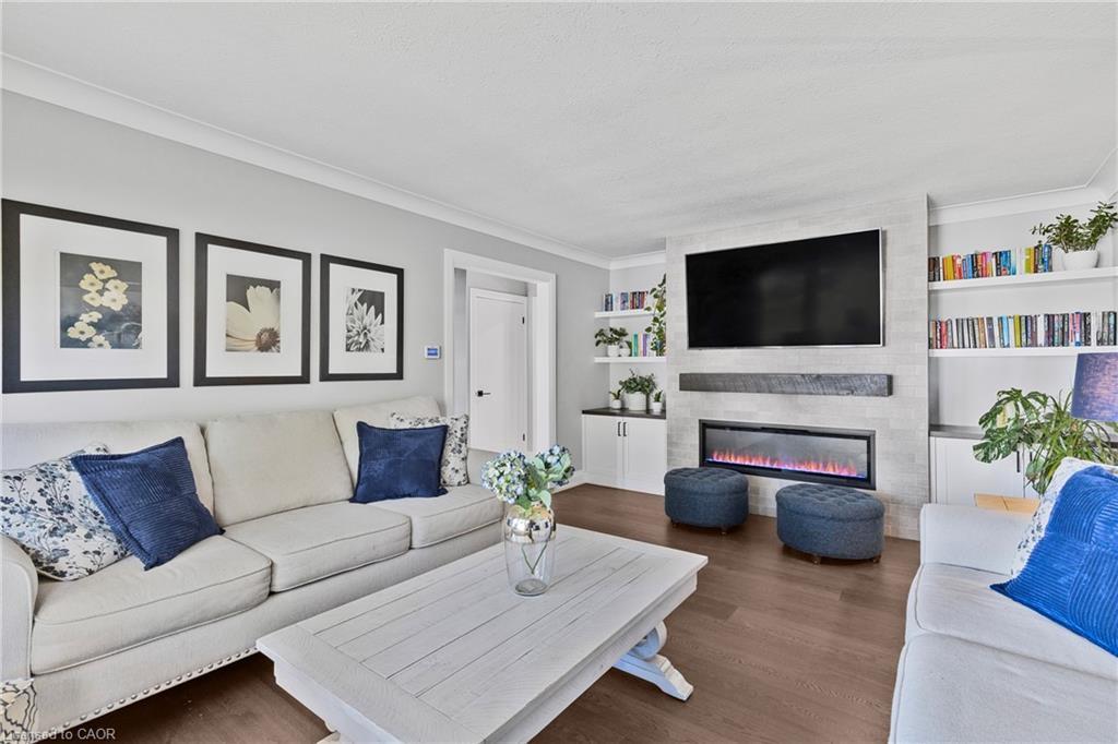 94 Dorchester Drive, Grimsby, ON - Indoor Photo Showing Living Room With Fireplace