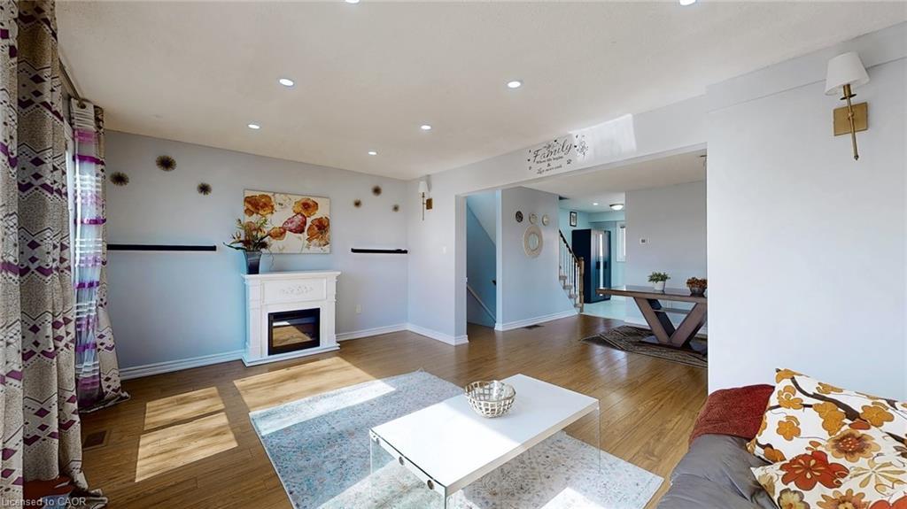43-1155 Paramount Drive, Stoney Creek, ON - Indoor Photo Showing Living Room With Fireplace