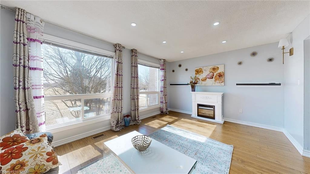 43-1155 Paramount Drive, Stoney Creek, ON - Indoor Photo Showing Living Room With Fireplace