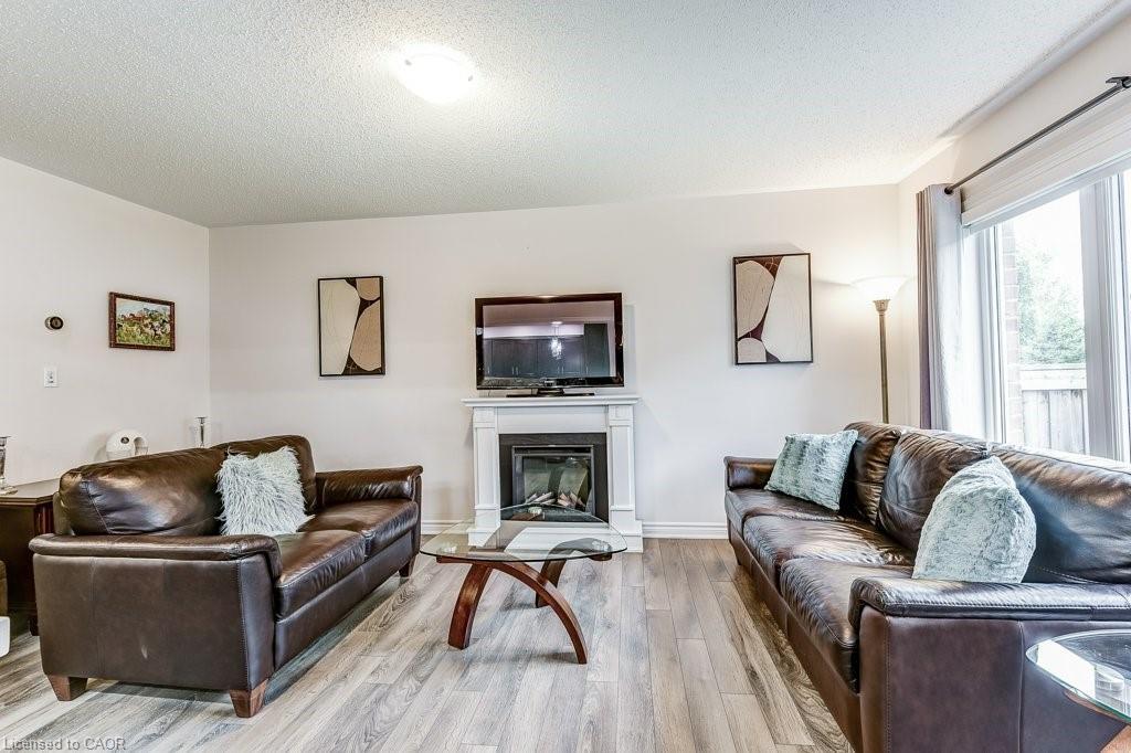 35 Dredge Court, Milton, ON - Indoor Photo Showing Living Room With Fireplace
