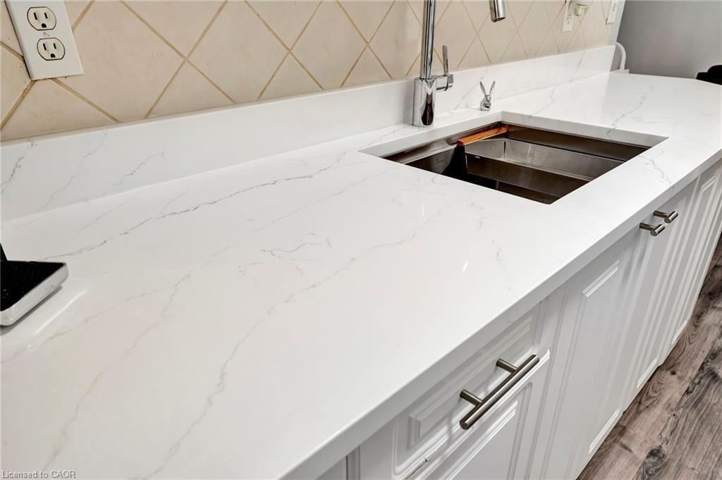 307-11 Woodman Drive S, Hamilton, ON - Indoor Photo Showing Kitchen With Double Sink