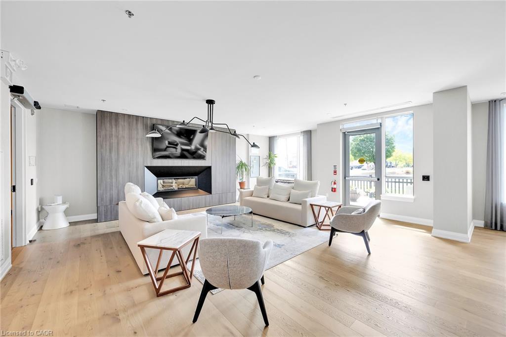 301-121 Highway 8, Stoney Creek, ON - Indoor Photo Showing Living Room With Fireplace