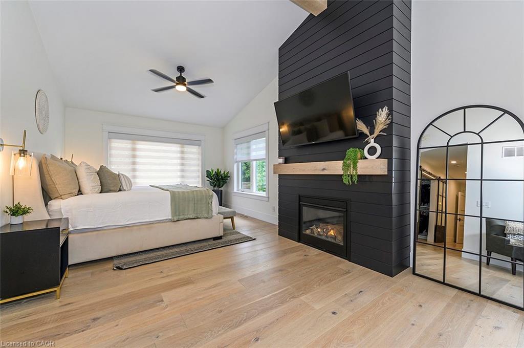 2560 2 Side Road, Burlington, ON - Indoor Photo Showing Bedroom With Fireplace