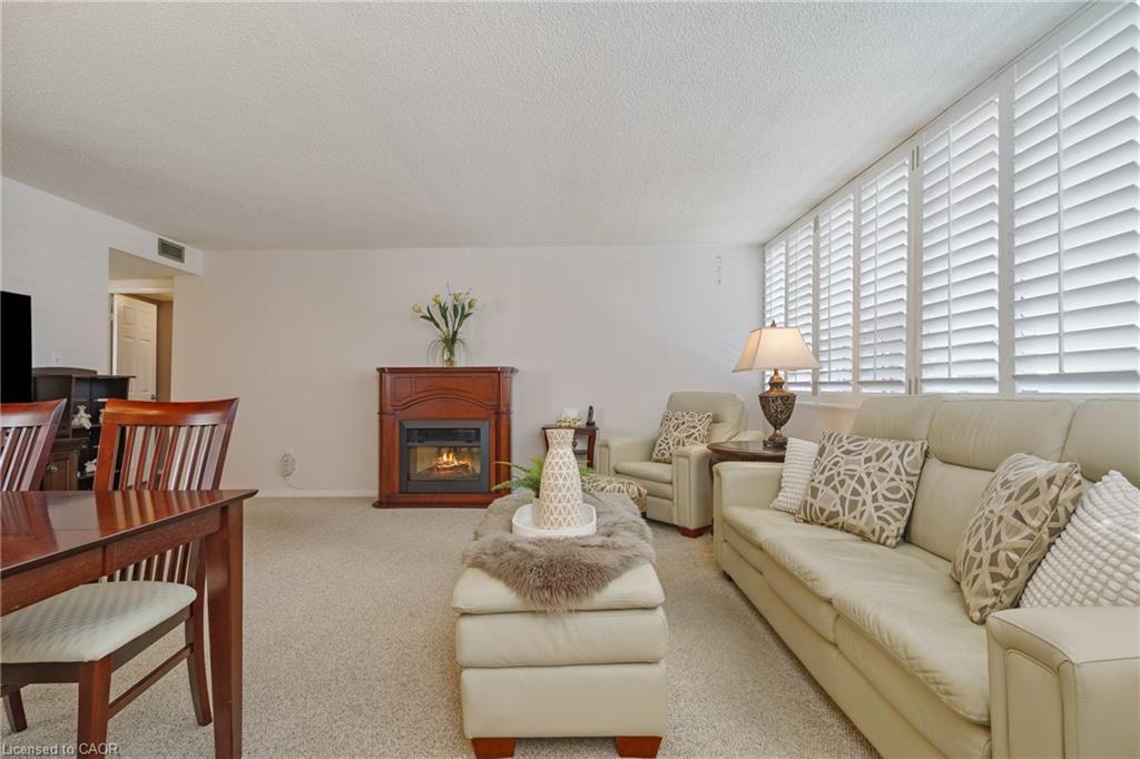 403-120 Duke Street, Hamilton, ON - Indoor Photo Showing Living Room With Fireplace