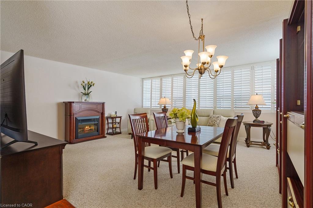 403-120 Duke Street, Hamilton, ON - Indoor Photo Showing Dining Room With Fireplace