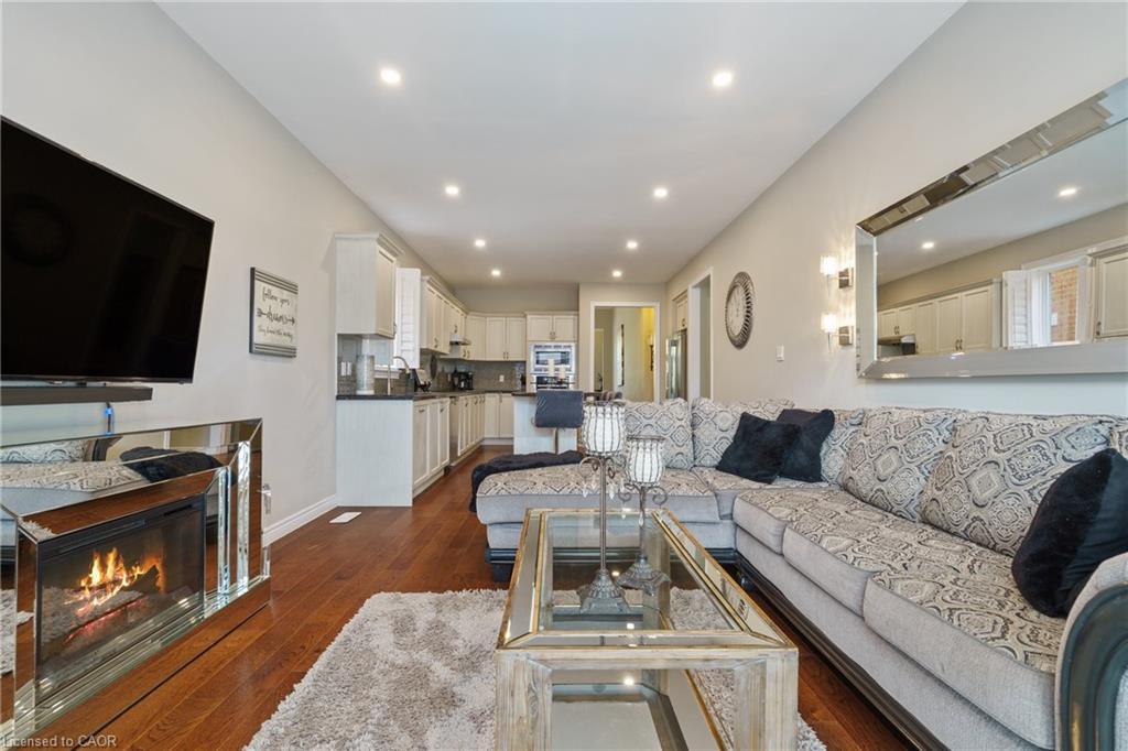 21 Shade Forest Trail, Hamilton, ON - Indoor Photo Showing Living Room With Fireplace