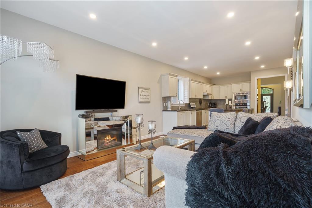 21 Shade Forest Trail, Hamilton, ON - Indoor Photo Showing Living Room With Fireplace