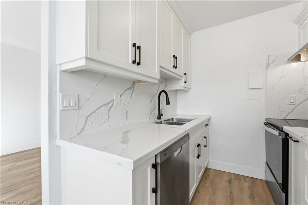22-2322 King Street E, Hamilton, ON - Indoor Photo Showing Kitchen With Stainless Steel Kitchen With Double Sink