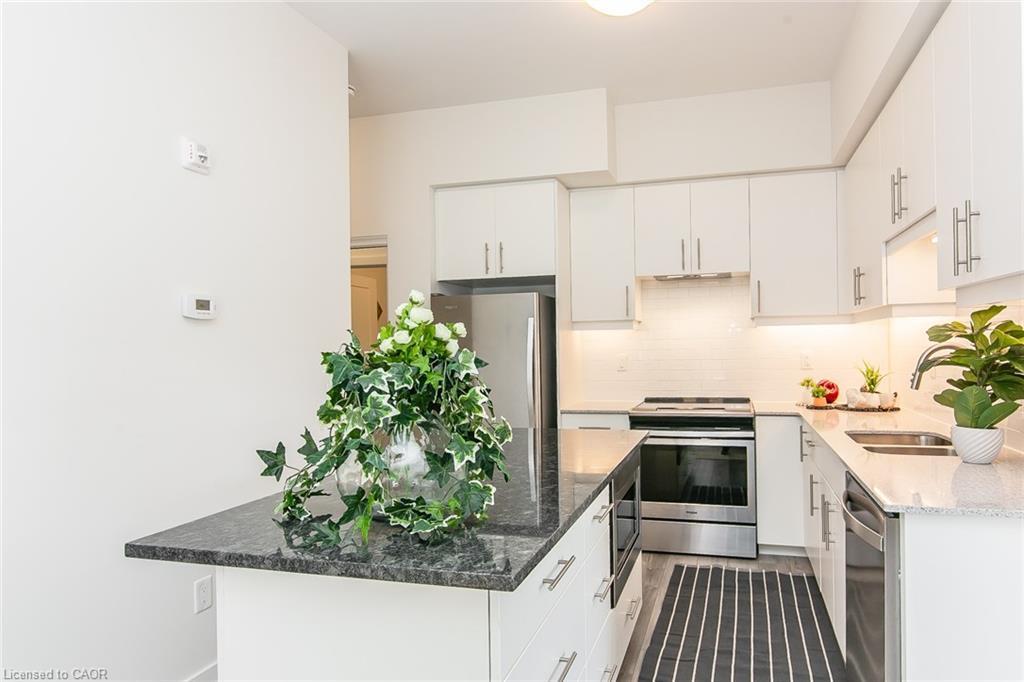 102-251 Northfield Drive E, Waterloo, ON - Indoor Photo Showing Kitchen With Stainless Steel Kitchen With Double Sink With Upgraded Kitchen