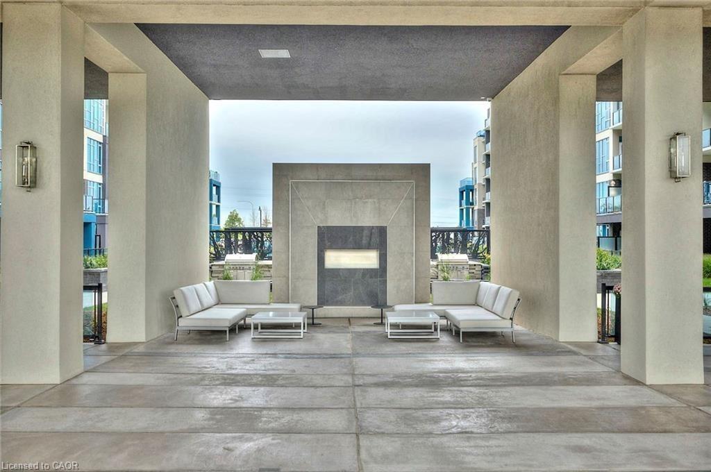 439-16 Concord Place, Grimsby, ON - Indoor With Fireplace